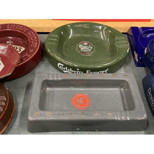 255 - THREE CERAMIC ASHTRAYS TO INCLUDE HOLSTEN, CARLSBERG AND HOFMEISTER