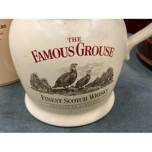 262 - TWO WHISKY WATER JUGS TO INCLLUDE FAMOUS GROUSE AND GLENLIVET