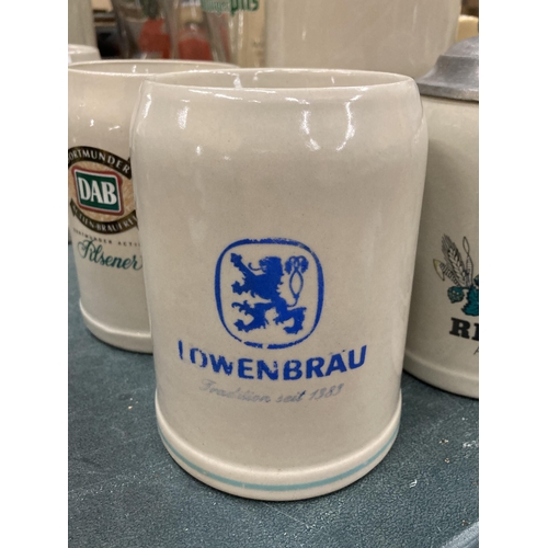 263 - FOUR STONEWARE STEINS TO INCLUDE KUNHLE, DAB, RIEGELE AND LOWENBRAU