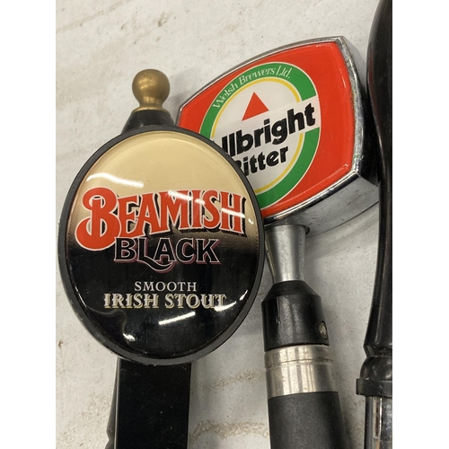 284 - THREE PUMP HEADS TO INCLUDE BEAMISH IRISH STOUT AND ALLBRIGHT BITTER