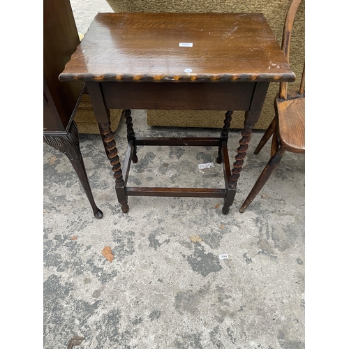 2692 - AN EARLY 20TH CENTURY OAK BARLEYTWIST CENTRE TABLE