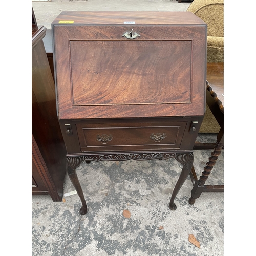 2693 - A MID 20TH CENTURY MAHOGANY BUREAU ON CABRIOLE LEGS, 21