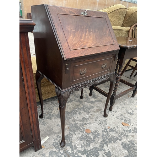 2693 - A MID 20TH CENTURY MAHOGANY BUREAU ON CABRIOLE LEGS, 21