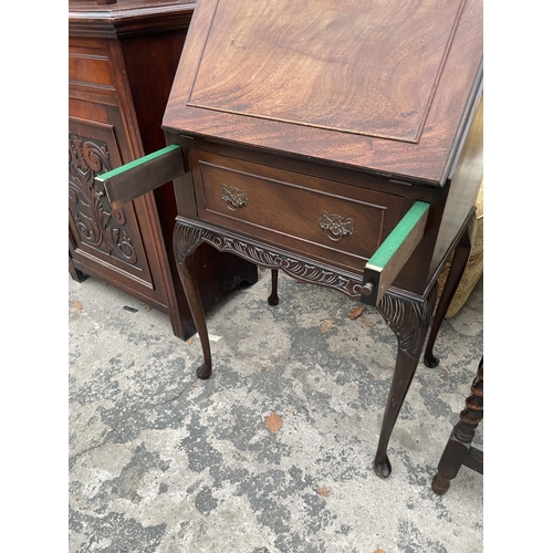 2693 - A MID 20TH CENTURY MAHOGANY BUREAU ON CABRIOLE LEGS, 21