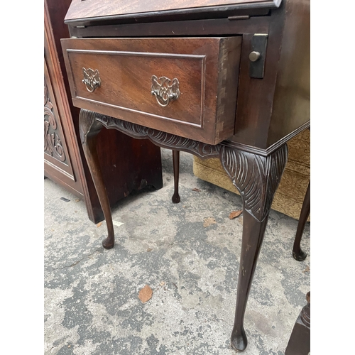 2693 - A MID 20TH CENTURY MAHOGANY BUREAU ON CABRIOLE LEGS, 21