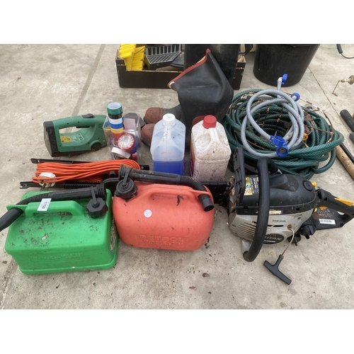 1750 - AN ASSORTMENT OF ITEMS TO INCLUDE A TITAN PETROL CHAINSAW, TWO PETROL CANS AND WELLIES ETC