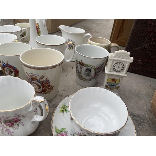 1878 - AN ASSORTMENT OF CERAMIC ITEMS TO INCLUDE CUPS AND BUD VASES ETC