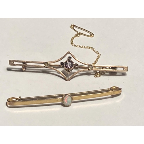 167 - TWO 9 CARAT GOLD BAR BROOCHES ONE WITH AN AMETHYST AND ONE WITH AN OPAL