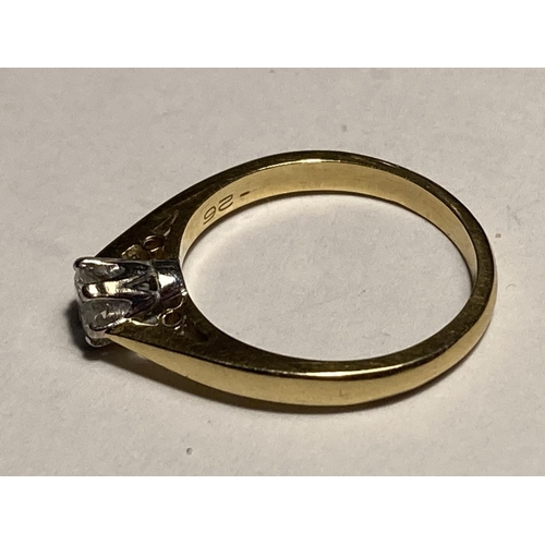 172 - AN 18 CARAT GOLD DIAMOND SOLITAIRE RING WITH PIERCED SHOULDERS SIZE L