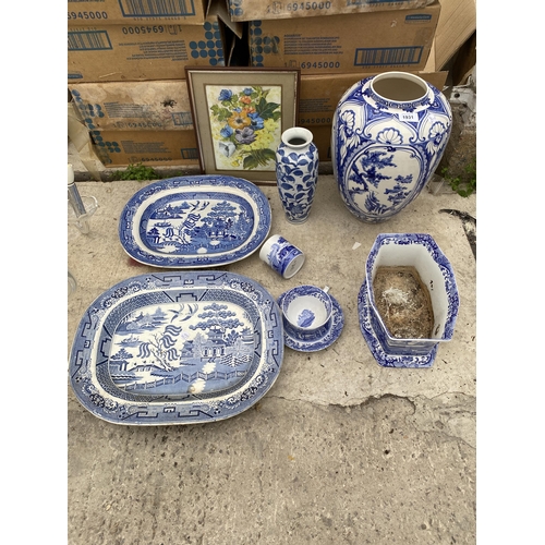 1931 - AN ASSORTMENT OF BLUE AND WHITE CERAMICS TO INCLUDE MEAT PLATTERS, VASES AND A PLANTER ETC