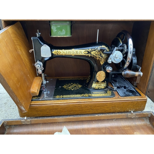 1974 - TWO VINTAGE SINGER SEWING MACHINES WITH CARRY CASES