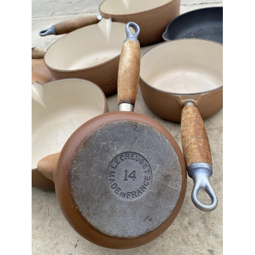 1976 - A SET OF SIX GRADUATED RETRO BROWN LE CREUSET PANS