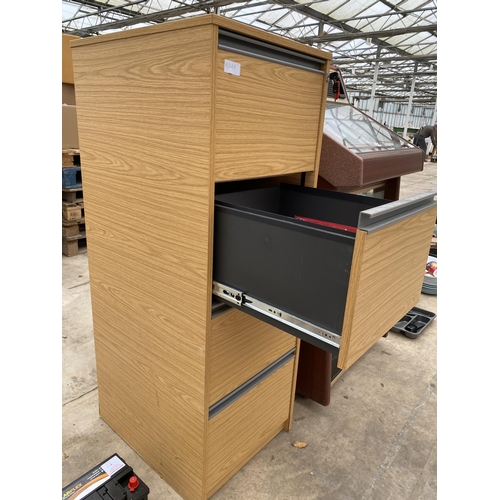 1979 - A FOUR DRAWER WOODEN FILING CABINET