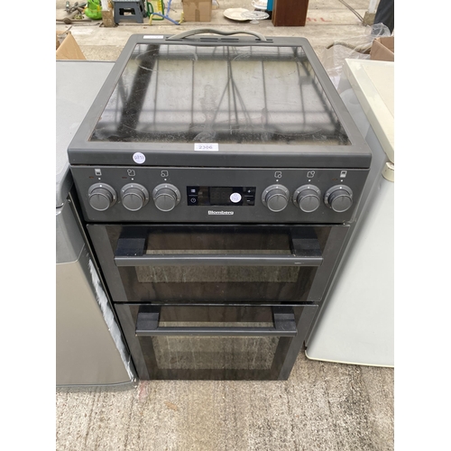 A BLACK BLOMBERG FREESTANDING ELECTRIC OVEN AND HOB
