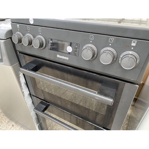 A BLACK BLOMBERG FREESTANDING ELECTRIC OVEN AND HOB