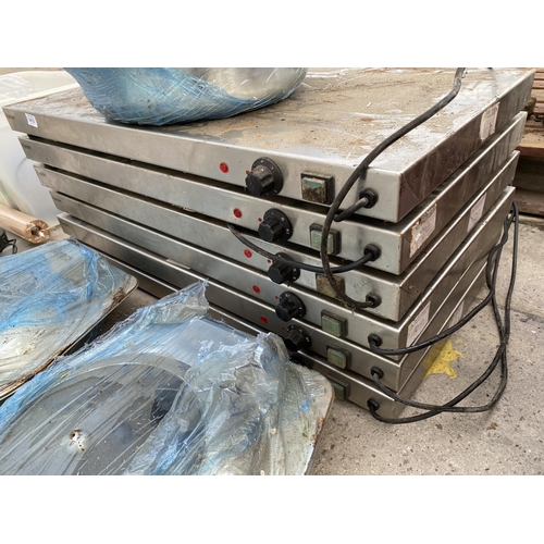 2412 - SIX STAINLESS STEEL BARTSCHER HEAT PLATES AND THREE BUFFET WARMING DISHES