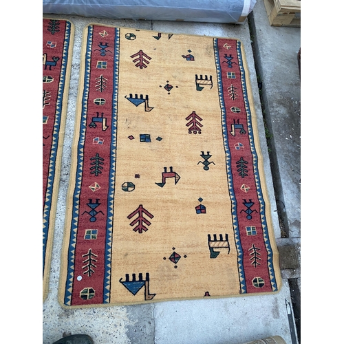 2484 - A PAIR OF MODERN PATTERNED RUGS