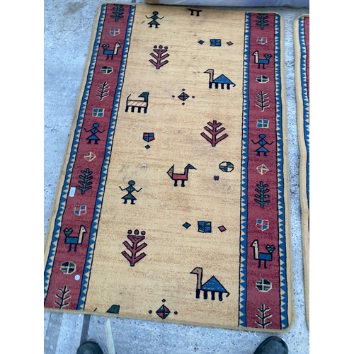 2484 - A PAIR OF MODERN PATTERNED RUGS