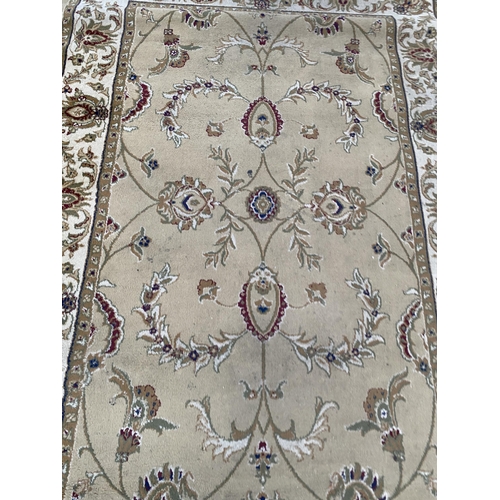 2485 - A BIEGE PATTERNED DUNELM RUG (160CM X 230CM)