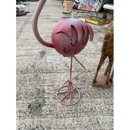 1615A - TWO TALL SAFARI ANIMAL FIGURES TO INCLUDE A TREEN GIRAFFE AND A METAL PINK FLAMINGO