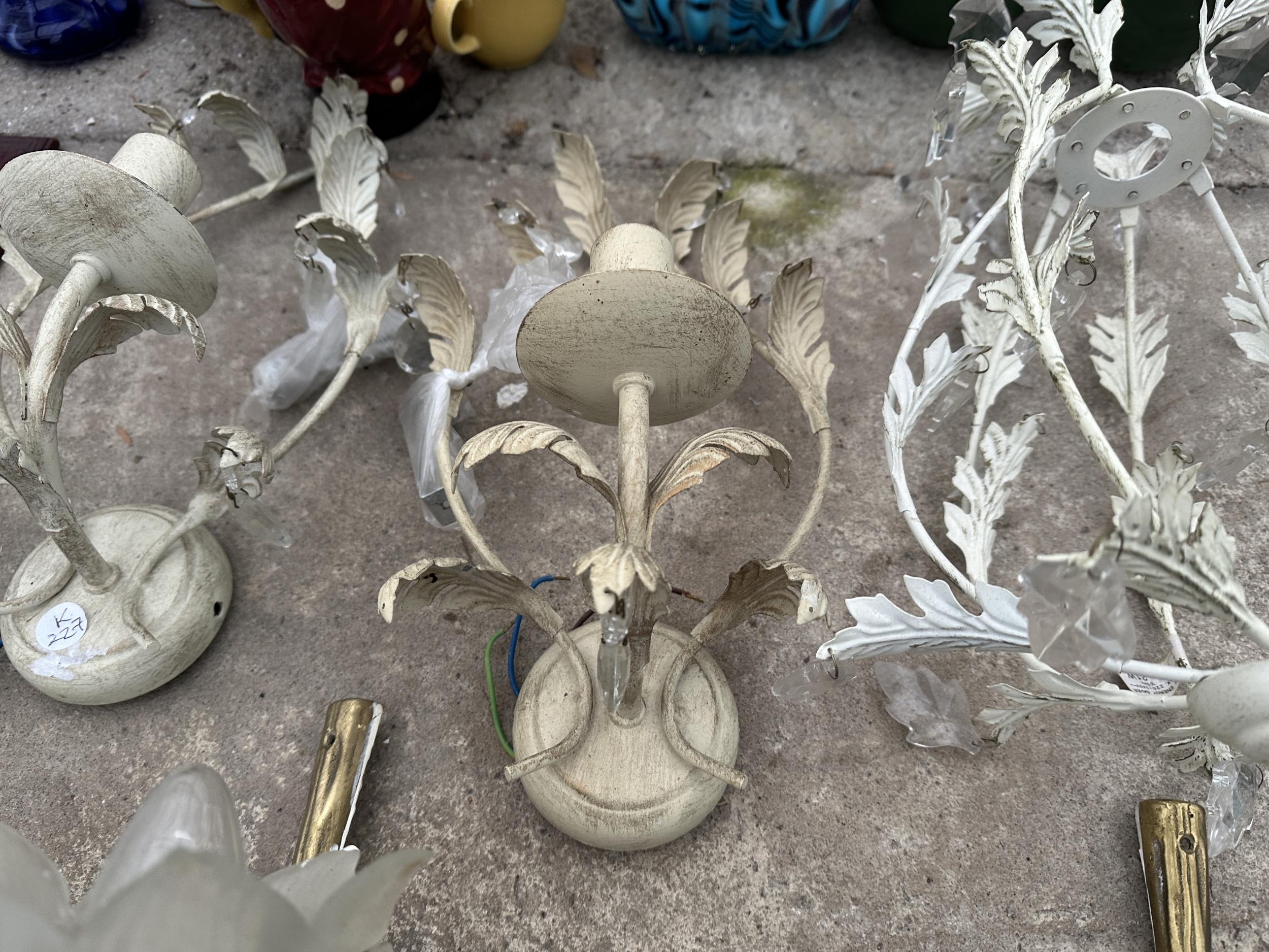 AN ASSORTMENT OF DECORATIVE LIGHT FITTINGS