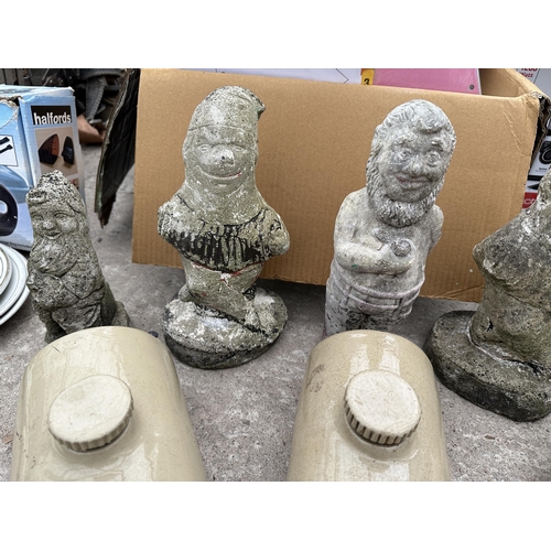 2049 - FOUR CONCRETE GARDEN GNOMES AND THREE STONEWARE HOT WATER BOTTLES