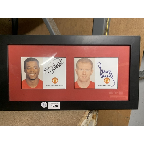 1235 - A FRAMED MANCHESTER UNITED SIGNED PICTURE - PATRICE EVRA AND PAUL SCHOLES