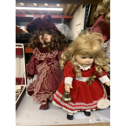 1241 - A GROUP OF ASSORTED DOLLS ON STANDS ETC