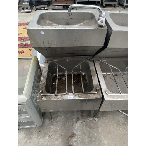 2470 - AN INDUSTRIAL STAINLESS STEEL TWO TIER SINK UNIT