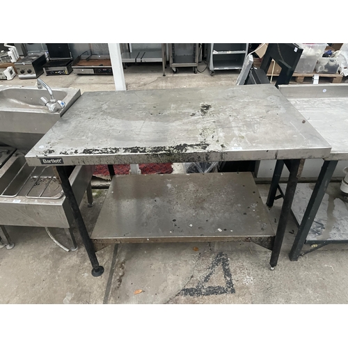 2472 - AN INDUSTRIAL STAINLESS STEEL TWO TIER KITCHEN WORK BENCH