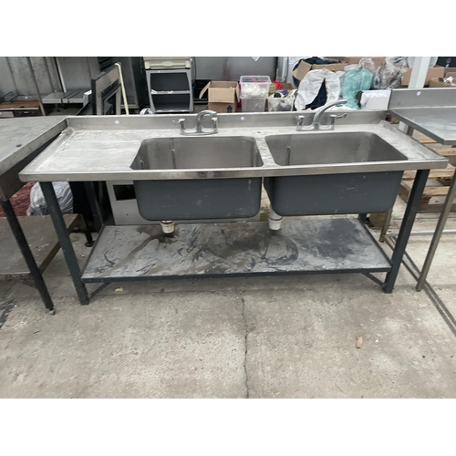 2473 - AN INDUSTRIAL STAINLESS STEEL DOUBLE SINK UNIT