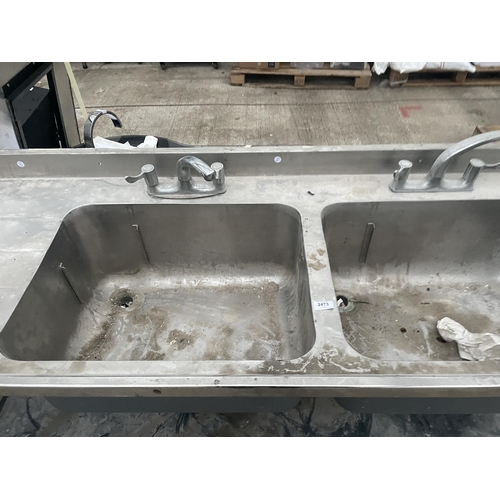 2473 - AN INDUSTRIAL STAINLESS STEEL DOUBLE SINK UNIT