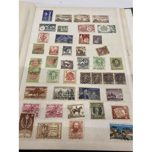 377 - AN ALBUM CONTAINING AUSTRALIAN STAMPS