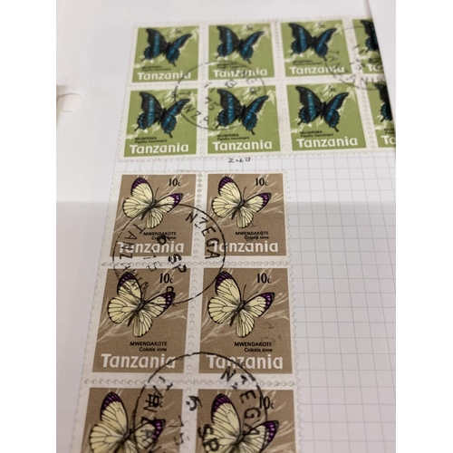 381 - TEN PLUS SHEETS CONTAINING STAMPS FROM TANZANIA