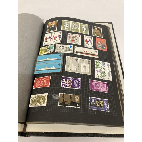 395 - AN ALBUM CONTAINING BLOCKS OF STAMPS TO INCLUDE COMMEMORATIVE, ETC.,