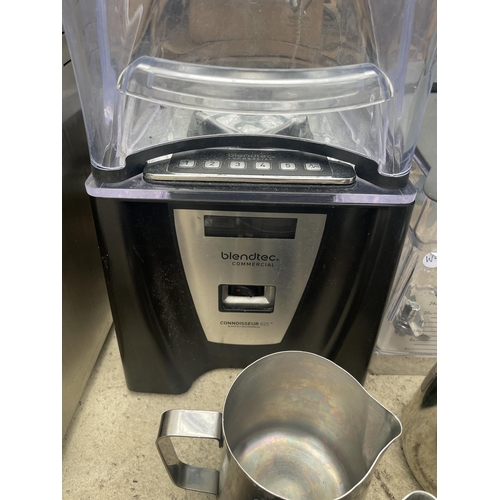 2478 - A BLENDTEC ELECTRIC SMOOTHIE MACHINE WITH BLENDTEC ATTATCHMENTS AND STAINLESS STEEL JUGS ETC