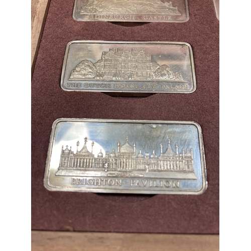 317 - A CASED COLLECTION OF 12 SOLID SILVER INGOTS OF ROYAL PALACES BY THE BIRMINGHAM MINT A LIMITED EDITI... 