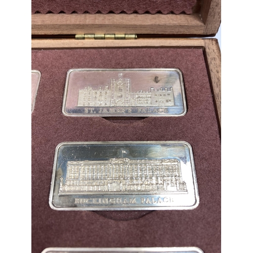 317 - A CASED COLLECTION OF 12 SOLID SILVER INGOTS OF ROYAL PALACES BY THE BIRMINGHAM MINT A LIMITED EDITI... 