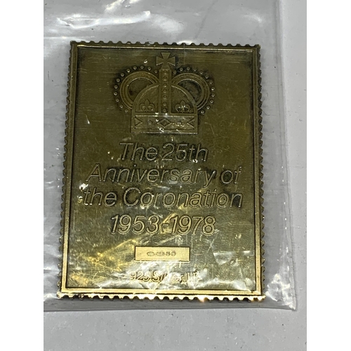 324A - A SILVER GILT 9P STAMP INGOT