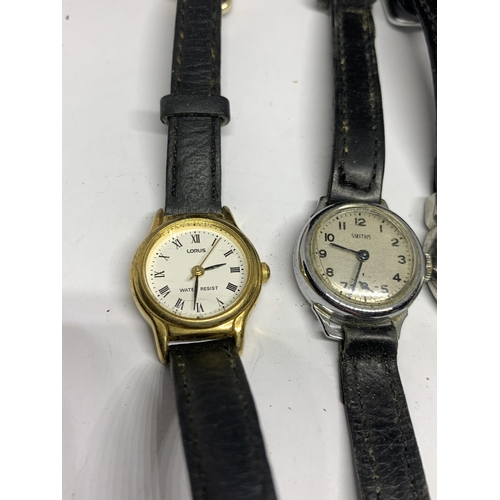 561 - FOUR LADIES WATCHES ON LEATHER STRAPS TO INCLUDE A VINTAGE SMITHS WATCH, LORUS, REFLEX, ETC