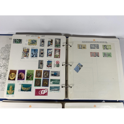 432 - TWO ALBUMS CONTAINING MIXED LOTS OF STAMPS OF THE WORLD TO INCLUDE ROMANIA, BULGARIA, EAST GERMANY, ... 