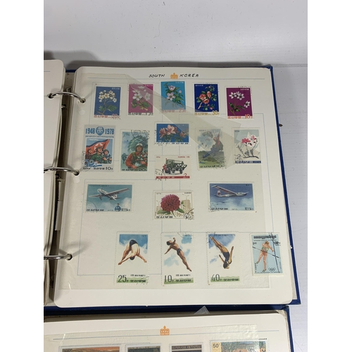 432 - TWO ALBUMS CONTAINING MIXED LOTS OF STAMPS OF THE WORLD TO INCLUDE ROMANIA, BULGARIA, EAST GERMANY, ... 