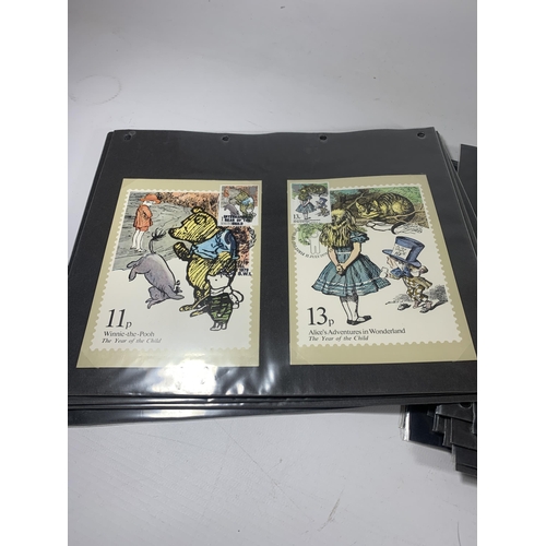 438 - A QUANTITY OF STAMP POSTCARDS TO INCLUDE WINNIE THE POOH, ALICE'S ADVENTURE IN WONDERLAND, 25TH ANNI... 