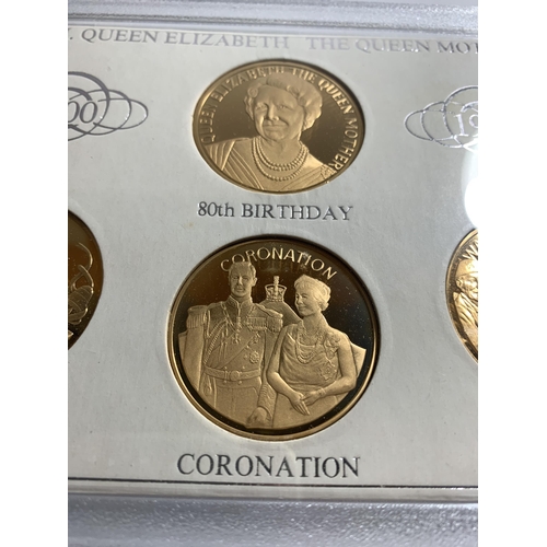 456 - A COMMEMORATIVE COIN SET CELEBRATING THE QUEEN MOTHER'S 80TH BIRTHDAY MINTED FROM SOLID BRONZE WITH ... 