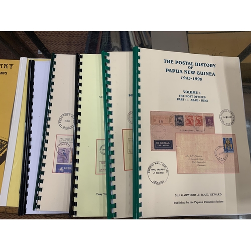 498A - A QUANTITY OF BOOKS AND BINDERS TO INCLUDE THE POSTAL HISTORY OF THE TERRITORY OF NEW GUINEA FROM 18... 