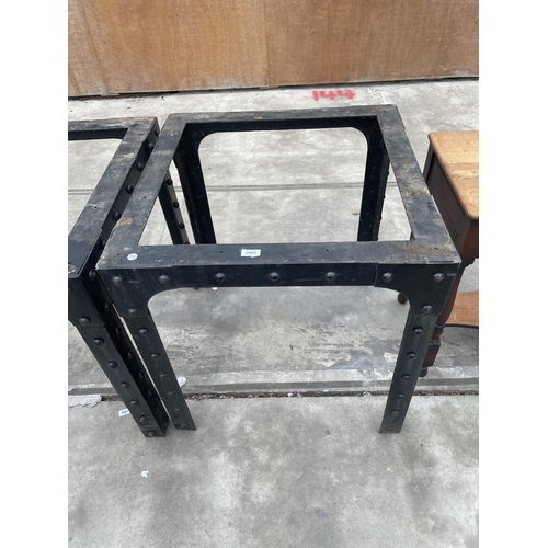 2883 - A PAIR OF CAST IRON INDUSTRIAL LOOK TABLES, BASE EMBELLISHED WITH STUBS, 28