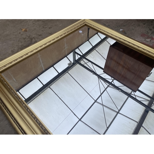 2896 - A GILT FRAMED WALL MIRROR, 41 X 30