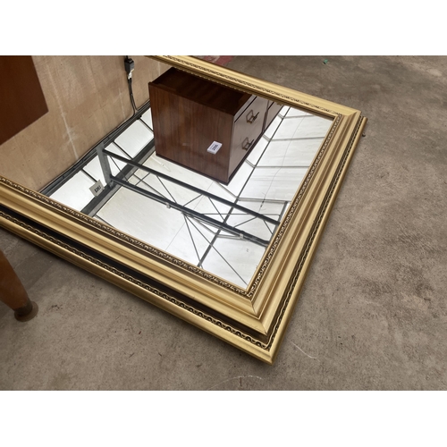 2896 - A GILT FRAMED WALL MIRROR, 41 X 30