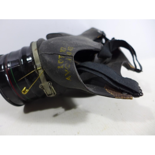 317 - A WORLD WAR II GAS MASK DATED 1942