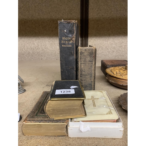 1238 - THREE VINTAGE POCKET BIBLES AND A CHURCH BIBLE